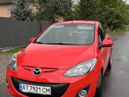 Красный Мазда 2, объемом двигателя 1.5 л и пробегом 157 тыс. км за 7700 $, фото 1 на Automoto.ua