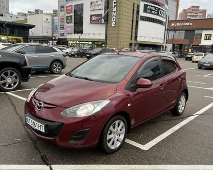 Красный Мазда 2, объемом двигателя 1.5 л и пробегом 112 тыс. км за 7900 $, фото 1 на Automoto.ua