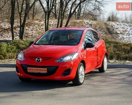 Червоний Мазда 2, об'ємом двигуна 1.3 л та пробігом 130 тис. км за 5400 $, фото 1 на Automoto.ua