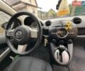 Желтый Мазда 2, объемом двигателя 1.5 л и пробегом 192 тыс. км за 7000 $, фото 13 на Automoto.ua