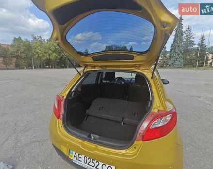 Жовтий Мазда 2, об'ємом двигуна 1.5 л та пробігом 74 тис. км за 5600 $, фото 16 на Automoto.ua