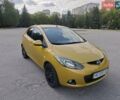 Жовтий Мазда 2, об'ємом двигуна 1.5 л та пробігом 74 тис. км за 5600 $, фото 1 на Automoto.ua