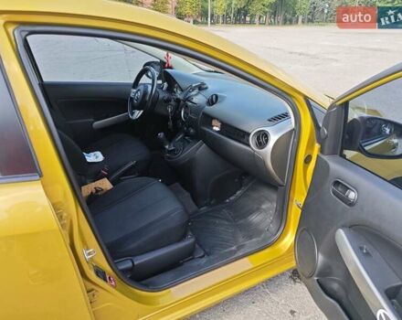 Жовтий Мазда 2, об'ємом двигуна 1.5 л та пробігом 74 тис. км за 5600 $, фото 8 на Automoto.ua