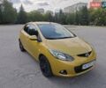 Жовтий Мазда 2, об'ємом двигуна 1.5 л та пробігом 74 тис. км за 5600 $, фото 1 на Automoto.ua