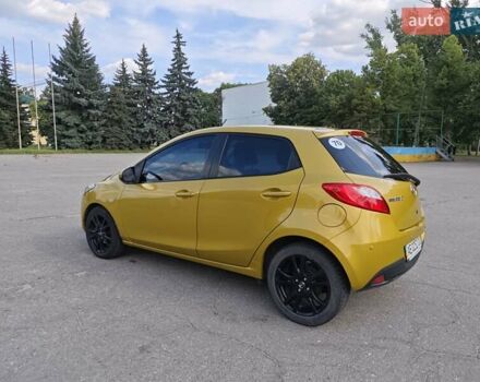 Жовтий Мазда 2, об'ємом двигуна 1.5 л та пробігом 74 тис. км за 5600 $, фото 4 на Automoto.ua