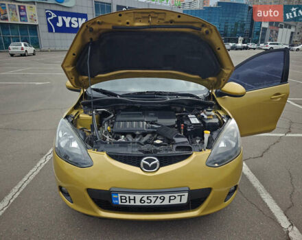 Жовтий Мазда 2, об'ємом двигуна 1.5 л та пробігом 103 тис. км за 6200 $, фото 3 на Automoto.ua