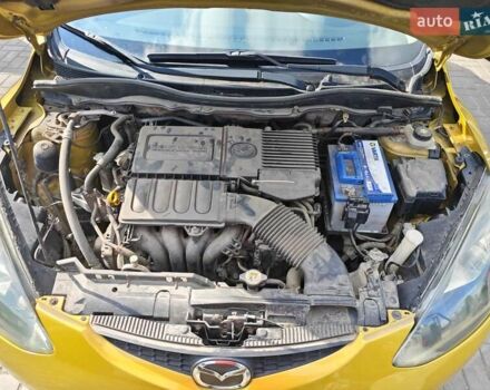 Жовтий Мазда 2, об'ємом двигуна 1.5 л та пробігом 74 тис. км за 5600 $, фото 20 на Automoto.ua