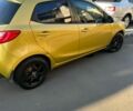 Желтый Мазда 2, объемом двигателя 1.5 л и пробегом 135 тыс. км за 7000 $, фото 2 на Automoto.ua