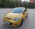Желтый Мазда 2, объемом двигателя 1.5 л и пробегом 74 тыс. км за 5600 $, фото 1 на Automoto.ua