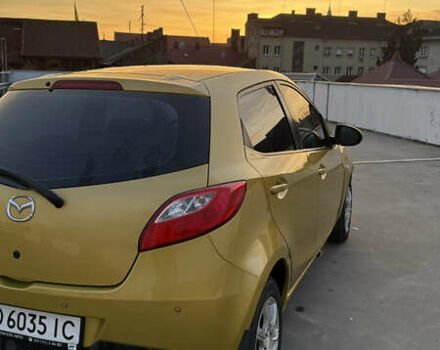 Желтый Мазда 2, объемом двигателя 1.5 л и пробегом 135 тыс. км за 8000 $, фото 4 на Automoto.ua