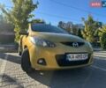Желтый Мазда 2, объемом двигателя 1.5 л и пробегом 139 тыс. км за 6500 $, фото 9 на Automoto.ua