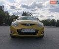 Жовтий Мазда 2, об'ємом двигуна 1.5 л та пробігом 74 тис. км за 5600 $, фото 2 на Automoto.ua