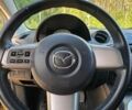 Желтый Мазда 2, объемом двигателя 1.5 л и пробегом 192 тыс. км за 7000 $, фото 10 на Automoto.ua