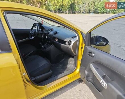 Жовтий Мазда 2, об'ємом двигуна 1.5 л та пробігом 74 тис. км за 5600 $, фото 10 на Automoto.ua