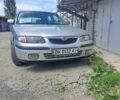 Серый Мазда 2, объемом двигателя 0 л и пробегом 900 тыс. км за 2999 $, фото 1 на Automoto.ua