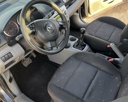 Серый Мазда 2, объемом двигателя 1.39 л и пробегом 120 тыс. км за 2999 $, фото 10 на Automoto.ua