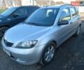 Сірий Мазда 2, об'ємом двигуна 1.39 л та пробігом 226 тис. км за 3300 $, фото 2 на Automoto.ua