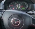 Сірий Мазда 2, об'ємом двигуна 1.4 л та пробігом 324 тис. км за 3500 $, фото 15 на Automoto.ua