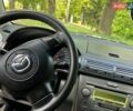Серый Мазда 2, объемом двигателя 1.39 л и пробегом 150 тыс. км за 3000 $, фото 3 на Automoto.ua