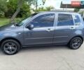 Сірий Мазда 2, об'ємом двигуна 1.4 л та пробігом 304 тис. км за 3200 $, фото 11 на Automoto.ua