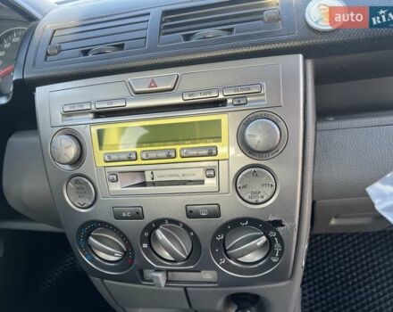 Серый Мазда 2, объемом двигателя 1.39 л и пробегом 120 тыс. км за 2999 $, фото 5 на Automoto.ua