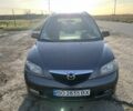 Серый Мазда 2, объемом двигателя 1.4 л и пробегом 120 тыс. км за 2999 $, фото 1 на Automoto.ua
