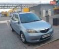 Серый Мазда 2, объемом двигателя 1.4 л и пробегом 250 тыс. км за 3400 $, фото 1 на Automoto.ua