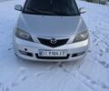 Сірий Мазда 2, об'ємом двигуна 1.4 л та пробігом 324 тис. км за 3500 $, фото 1 на Automoto.ua