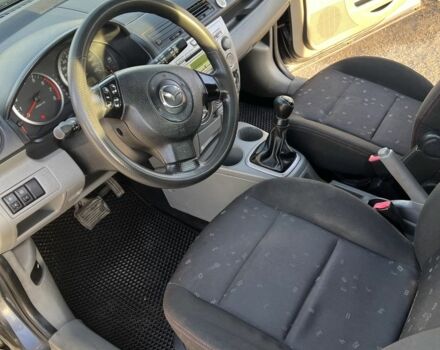 Серый Мазда 2, объемом двигателя 1.4 л и пробегом 120 тыс. км за 2999 $, фото 4 на Automoto.ua