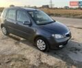 Серый Мазда 2, объемом двигателя 1.39 л и пробегом 120 тыс. км за 2999 $, фото 1 на Automoto.ua