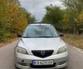 Серый Мазда 2, объемом двигателя 1.4 л и пробегом 248 тыс. км за 3499 $, фото 1 на Automoto.ua
