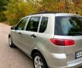 Сірий Мазда 2, об'ємом двигуна 1.4 л та пробігом 250 тис. км за 3000 $, фото 4 на Automoto.ua