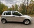 Серый Мазда 2, объемом двигателя 1.4 л и пробегом 248 тыс. км за 3499 $, фото 1 на Automoto.ua