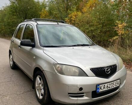 Серый Мазда 2, объемом двигателя 1.4 л и пробегом 248 тыс. км за 3100 $, фото 1 на Automoto.ua