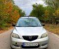 Сірий Мазда 2, об'ємом двигуна 1.4 л та пробігом 250 тис. км за 3000 $, фото 1 на Automoto.ua