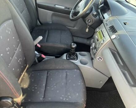 Серый Мазда 2, объемом двигателя 1.39 л и пробегом 120 тыс. км за 2999 $, фото 7 на Automoto.ua