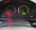 Серый Мазда 2, объемом двигателя 1.4 л и пробегом 295 тыс. км за 3300 $, фото 11 на Automoto.ua