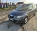 Серый Мазда 2, объемом двигателя 1.4 л и пробегом 120 тыс. км за 2999 $, фото 2 на Automoto.ua