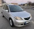 Серый Мазда 2, объемом двигателя 1.4 л и пробегом 295 тыс. км за 3300 $, фото 1 на Automoto.ua