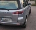 Серый Мазда 2, объемом двигателя 1.4 л и пробегом 245 тыс. км за 3010 $, фото 4 на Automoto.ua