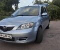 Серый Мазда 2, объемом двигателя 1.4 л и пробегом 245 тыс. км за 3010 $, фото 1 на Automoto.ua