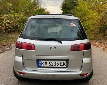 Серый Мазда 2, объемом двигателя 1.4 л и пробегом 248 тыс. км за 3499 $, фото 3 на Automoto.ua