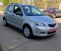 Серый Мазда 2, объемом двигателя 1.4 л и пробегом 218 тыс. км за 4900 $, фото 1 на Automoto.ua