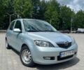 Серый Мазда 2, объемом двигателя 1.4 л и пробегом 262 тыс. км за 2900 $, фото 1 на Automoto.ua
