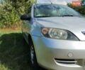 Сірий Мазда 2, об'ємом двигуна 1.4 л та пробігом 290 тис. км за 3500 $, фото 3 на Automoto.ua