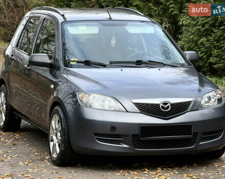 Серый Мазда 2, объемом двигателя 1.4 л и пробегом 247 тыс. км за 3350 $, фото 1 на Automoto.ua