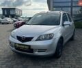 Серый Мазда 2, объемом двигателя 1.39 л и пробегом 130 тыс. км за 4300 $, фото 1 на Automoto.ua