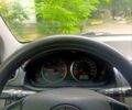 Серый Мазда 2, объемом двигателя 1.4 л и пробегом 329 тыс. км за 2700 $, фото 2 на Automoto.ua