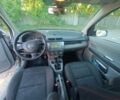 Серый Мазда 2, объемом двигателя 1.4 л и пробегом 245 тыс. км за 1399 $, фото 5 на Automoto.ua