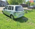 Серый Мазда 2, объемом двигателя 1.39 л и пробегом 127 тыс. км за 3300 $, фото 3 на Automoto.ua